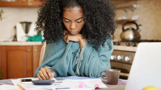 woman looking at paperwork