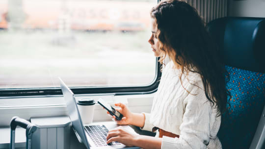 Woman typing on computer