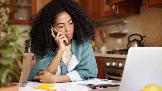 Frustrated woman with laptop