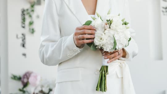bride wearing suit