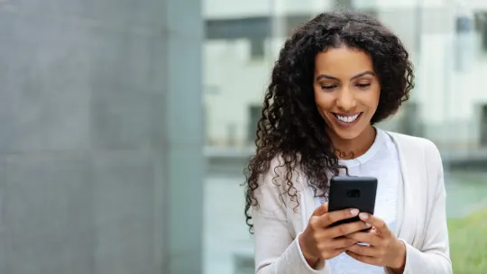 woman emailing from her phone