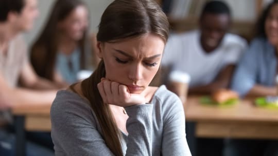 woman with low self-esteem feeling like an outsider