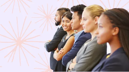 a young woman smiling in line amongst other interns