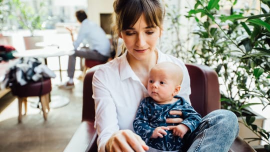 Mom with baby at work
