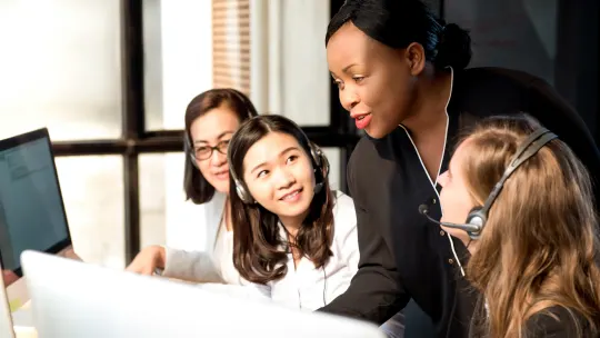 women talking at work