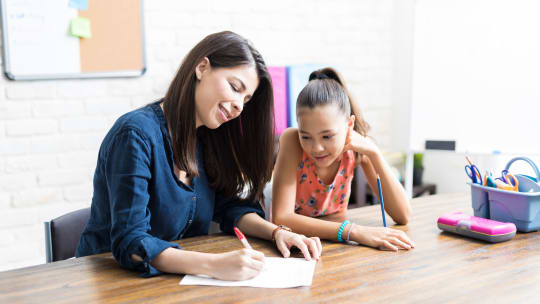 tutor working with student