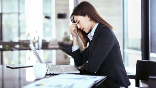 Stressed woman at work