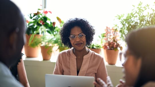 Woman interviewer smiling