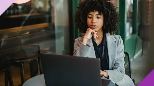 Woman thinking, looking for another word for detail-oriented