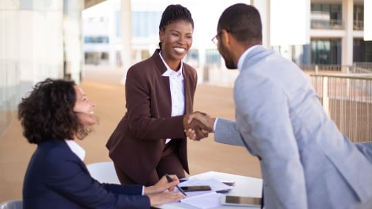 businesspeople shaking hands
