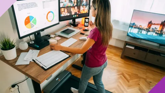 woman walking on a treadmill desk