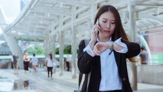 Woman looking at watch