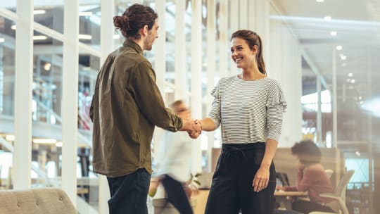 two people shaking hands