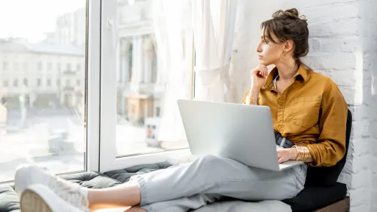 Woman working at cafe