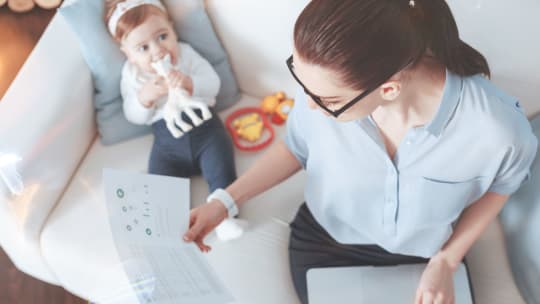 Mom with baby working