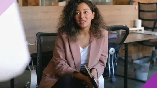 Woman daydreaming at work