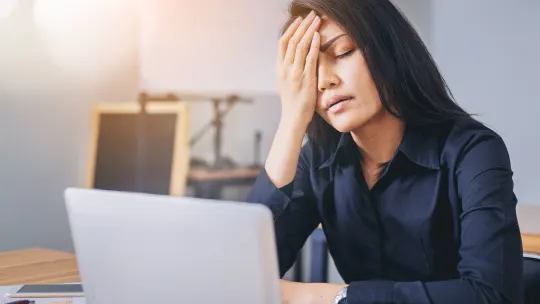 Frustrated woman at work
