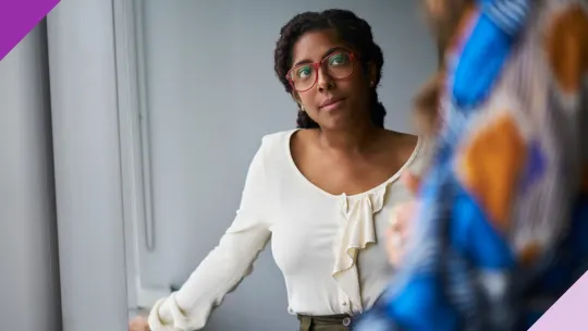 Colleagues in an office setting, illustrating signs of toxic friends