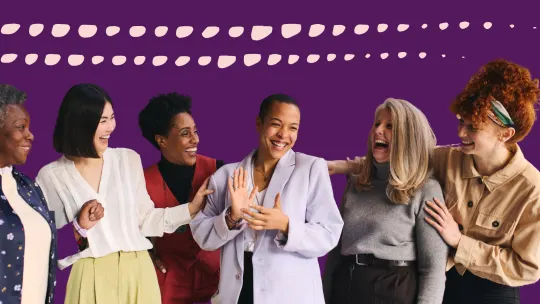 a group of women celebrating at work