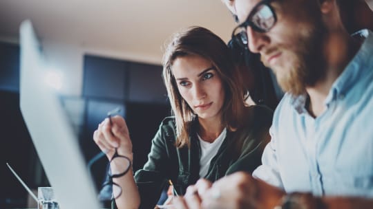 UX designer working with colleague