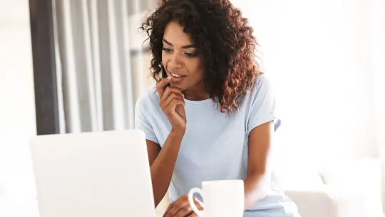 woman typing on laptop