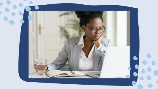 woman looking at computer
