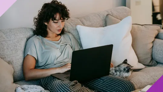 Woman working from sofa