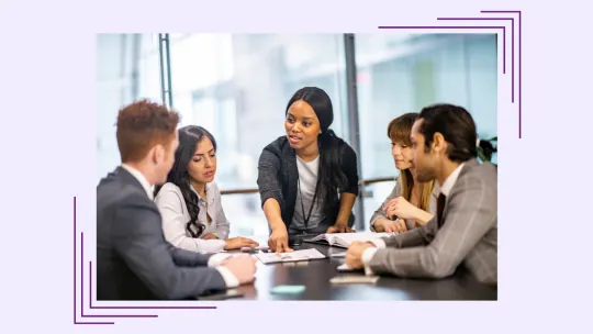 Five people in a meeting.