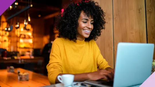 Woman sending emails on her computer