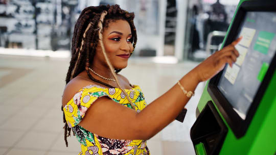 Woman at ATM