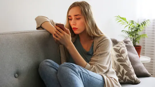 Woman holding phone