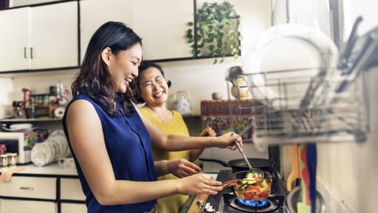 mother talking to adult daughter