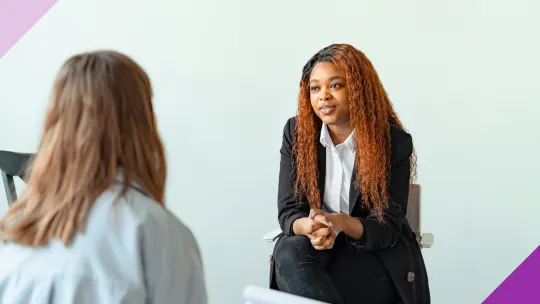 Candidate in a job interview, illustrating how to explain gaps in a resume