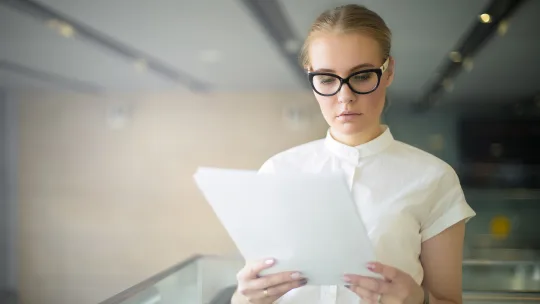 woman reading over resume
