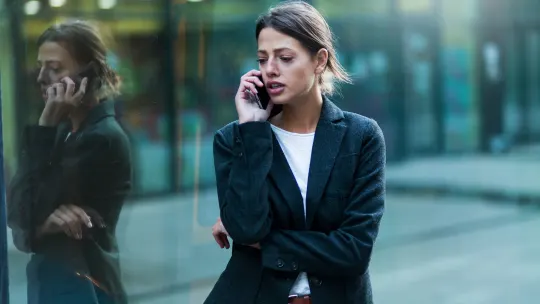 Frustrated woman on phone