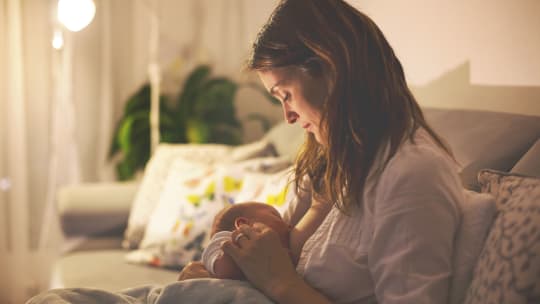 Woman with newborn baby