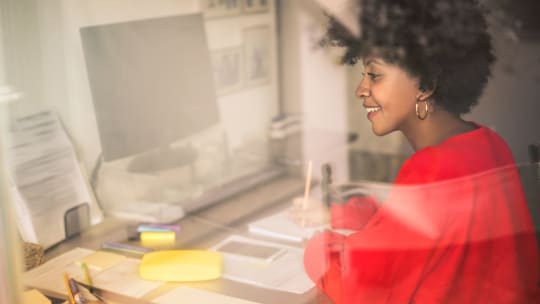 Happy woman working