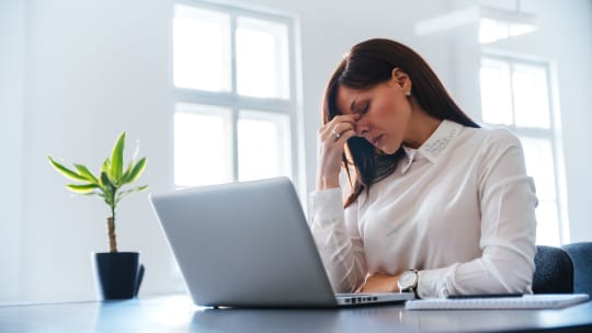 Unhappy woman at work