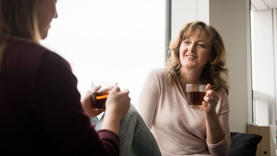 Mom talking to daughter
