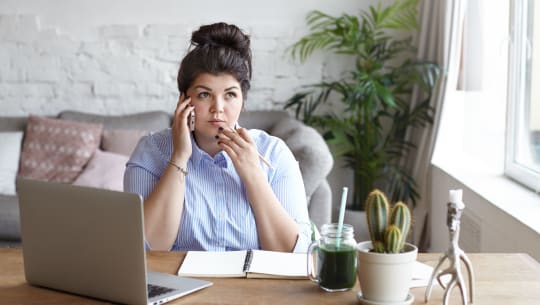 Woman working at a laptop