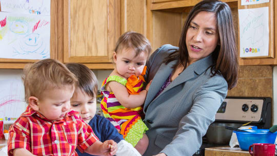 woman with three kids leaving for work