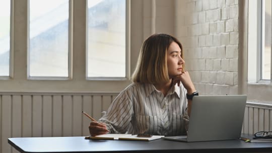 Woman looking at window