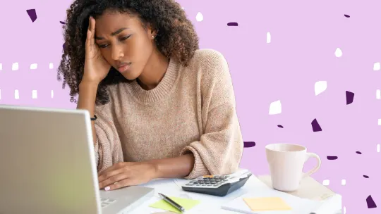 a woman stressed on a laptop