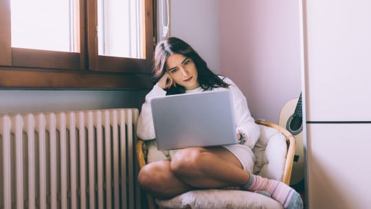 Stressed woman working at home