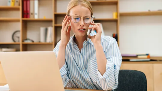 Woman upset on the phone