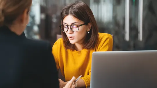 Woman talking in meeting