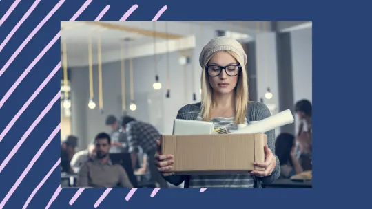 a woman looking down at a box