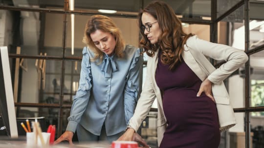Pregnant woman at work