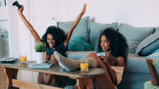 Women playing video games