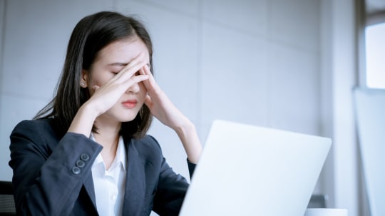 Woman upset over a mistake at work